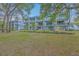 Exterior of a multi-story apartment building with balcony views and manicured lawn at 1816 Orangeburg St, North Charleston, SC 29405