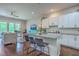 Open-concept kitchen and living area provides an ideal flow for entertaining guests at 1816 Orangeburg St, North Charleston, SC 29405
