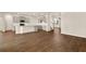Open-concept kitchen featuring grey cabinets, quartz countertops, stainless steel appliances, and a large island at 1824 Nola Run, Summerville, SC 29485