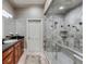 Bathroom featuring a granite sink, walk-in shower, and tile flooring at 1954 Sandy Point Ln, Mount Pleasant, SC 29466