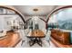 Elegant dining room featuring a large table, chandelier, hardwood floors, and seamless access to the foyer at 1954 Sandy Point Ln, Mount Pleasant, SC 29466