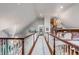 Grand hallway with exquisite chandelier, spiral staircase, and seamless flow into the living area at 1954 Sandy Point Ln, Mount Pleasant, SC 29466