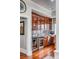 Wet bar with wine coolers and granite countertops, perfect for entertaining at 1954 Sandy Point Ln, Mount Pleasant, SC 29466