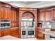 Gourmet kitchen features stainless steel appliances and custom cabinetry at 1954 Sandy Point Ln, Mount Pleasant, SC 29466