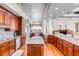 Spacious open concept kitchen featuring custom wood cabinets, granite counters and stainless appliances at 1954 Sandy Point Ln, Mount Pleasant, SC 29466