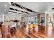 Open-concept area featuring kitchen, dining, living room, and backyard views, creating a spacious and inviting home at 1954 Sandy Point Ln, Mount Pleasant, SC 29466