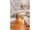 Spacious home with hardwood floors, grand staircase, dining area, and elegant lighting at 1954 Sandy Point Ln, Mount Pleasant, SC 29466