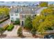 Aerial view of neighborhood with beautiful homes and lush trees at 21 Rutledge Ave, Charleston, SC 29401