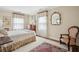 Cozy bedroom with soft light, patterned rugs, and traditional furnishings for a relaxing atmosphere at 21 Rutledge Ave, Charleston, SC 29401
