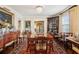 Formal dining room featuring a large table, chandelier, and classic accents at 21 Rutledge Ave, Charleston, SC 29401