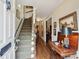 Welcoming entryway featuring hardwood floors, stairs, and elegant decor at 21 Rutledge Ave, Charleston, SC 29401