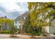 Beautiful two-story home with manicured landscaping at 21 Rutledge Ave, Charleston, SC 29401