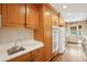 Functional kitchen area with ample cabinet space and a clean design at 21 Rutledge Ave, Charleston, SC 29401