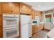 Efficient kitchen layout featuring wooden cabinets and modern appliances at 21 Rutledge Ave, Charleston, SC 29401