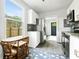 Eat-in kitchen with modern appliances, ample counter space, and a cozy dining nook at 2122 Commander Rd, North Charleston, SC 29405