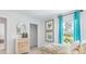 Bedroom with a dresser, closet and view to the outside at 2324 Macallan Blvd, Ravenel, SC 29470
