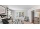 Comfortable bedroom featuring modern decor, decorative pillows, and ample natural light for a relaxing atmosphere at 2324 Macallan Blvd, Ravenel, SC 29470