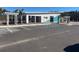 Hillcrest community clubhouse with ample parking, pergola, beachy blue accents, and manicured palm trees at 2324 Macallan Blvd, Ravenel, SC 29470