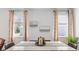 Bright dining area with modern decor, large windows, and stylish window treatments offers the perfect space for meals at 2324 Macallan Blvd, Ravenel, SC 29470