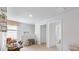 Bright hallway offers access to rooms upstairs, with a desk and shelving on the other side at 2324 Macallan Blvd, Ravenel, SC 29470