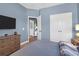 Cozy bedroom with dresser and access to the bathroom at 2338 Kings Gate Ln, Mount Pleasant, SC 29466