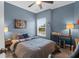 Cozy bedroom featuring ceiling fan, neutral walls, and a large window at 2338 Kings Gate Ln, Mount Pleasant, SC 29466