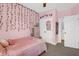 Cozy pink bedroom featuring unique wall vines and decorative details, perfect for a personalized touch at 2338 Kings Gate Ln, Mount Pleasant, SC 29466