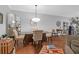 Dining area featuring a glass table, stylish chairs, and ample natural light at 2338 Kings Gate Ln, Mount Pleasant, SC 29466