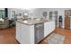 Kitchen island with granite countertops and stainless steel dishwasher in modern kitchen at 2338 Kings Gate Ln, Mount Pleasant, SC 29466