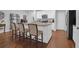 Modern kitchen featuring an island with granite countertops and stainless steel appliances at 2338 Kings Gate Ln, Mount Pleasant, SC 29466