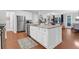Modern kitchen with stainless steel appliances and large island with granite counters at 2338 Kings Gate Ln, Mount Pleasant, SC 29466
