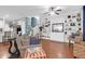 Bright living room with built-in shelves, neutral tones, and hardwood flooring at 2338 Kings Gate Ln, Mount Pleasant, SC 29466