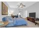 Spacious main bedroom with a ceiling fan and TV, offering great space and natural light at 2338 Kings Gate Ln, Mount Pleasant, SC 29466