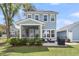 Charming backyard with a screened porch, landscaping, and outdoor grill at 2568 Hatch Dr, Johns Island, SC 29455
