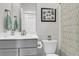 Well-lit bathroom featuring a modern vanity, toilet, and shower curtain at 2568 Hatch Dr, Johns Island, SC 29455