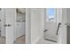 Conveniently located laundry room with washer, dryer, and shelving at 2568 Hatch Dr, Johns Island, SC 29455