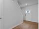 Foyer with wood-look floors leading to a staircase and front door at 257 Watersglen Dr, Summerville, SC 29486