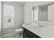 Bathroom featuring a toilet, vanity with white countertop, and a large mirror at 258 Godwit Dr, Summerville, SC 29486