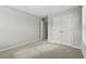 Cozy bedroom featuring plush carpeting and double door closet at 258 Godwit Dr, Summerville, SC 29486
