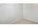 Empty closet with wire shelving and carpeted floors, ready for organized storage solutions at 258 Godwit Dr, Summerville, SC 29486