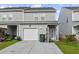 Charming two-story home with a garage and well-maintained lawn at 258 Godwit Dr, Summerville, SC 29486