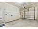 Spacious garage with garage door opener and utility hookups at 258 Godwit Dr, Summerville, SC 29486