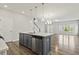 Open-concept kitchen with a sink in the island and stainless steel appliances at 258 Godwit Dr, Summerville, SC 29486