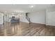 Bright living space featuring wood floors and an open layout to the kitchen and staircase at 258 Godwit Dr, Summerville, SC 29486