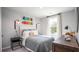 Cozy bedroom featuring neutral colors, stylish decor, and a comfortable bed at 329 Pine Crest View Dr, Summerville, SC 29486