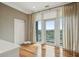 Bright room with hardwood floors and access to a balcony with views of the surrounding area at 341 Cooper River Dr, Mount Pleasant, SC 29464