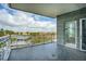 Private balcony with tile floors offering expansive views of the marsh and surrounding landscape at 341 Cooper River Dr, Mount Pleasant, SC 29464