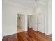 Spacious bedroom with hardwood floors, white trim and multiple closets at 341 Cooper River Dr, Mount Pleasant, SC 29464
