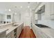 Bright kitchen features stainless steel appliances, marble countertops, and white cabinets with a gas range at 341 Cooper River Dr, Mount Pleasant, SC 29464