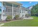 Beautiful backyard featuring a patio, lush lawn, and well-maintained landscaping at 3697 Stamler Ct, Mount Pleasant, SC 29466
